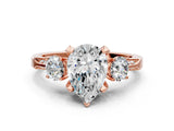 Rose gold Pear Cut Brilliant Three-Stone Diamond Ring with Pavé Band and Four-Prong Setting_3
