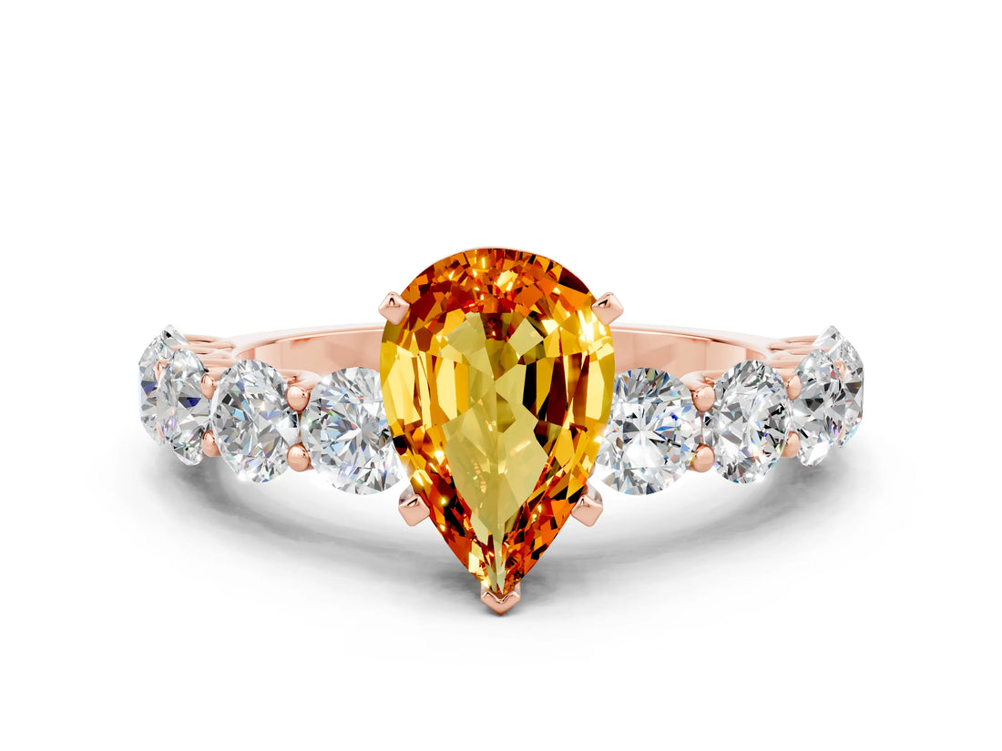 Rose gold Pear Cut Citrine Prong Setting with Side Stones on a Pave Band