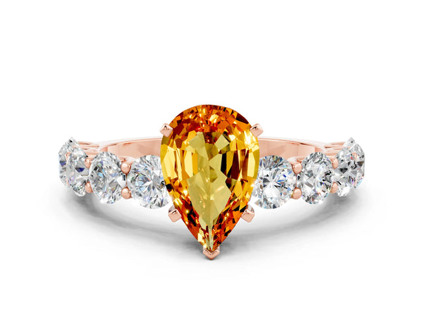 Rose gold Pear Cut Citrine Prong Setting with Side Stones on a Pave Band