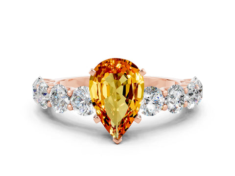 Rose gold Pear Cut Citrine Prong Setting with Side Stones on a Pave Band