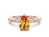 Rose gold Pear Cut Citrine Solitaire Engagement Ring with Pavé Band and Four-Prong Setting