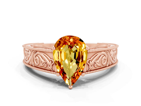 Rose gold Pear Cut Citrine Solitaire Ring with Engraved Band and Four-Prong Setting
