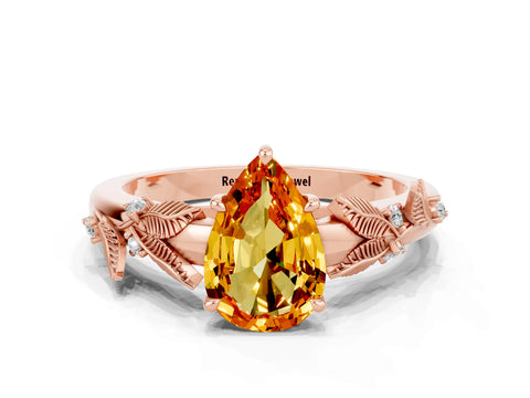 Rose gold Pear Cut Citrine Solitaire Ring with Leaf Motif Band and Four-Prong Setting