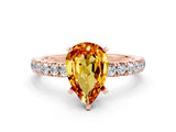 Rose gold Pear Cut Citrine Solitaire Ring with Pavé Accents and Four-Prong Setting
