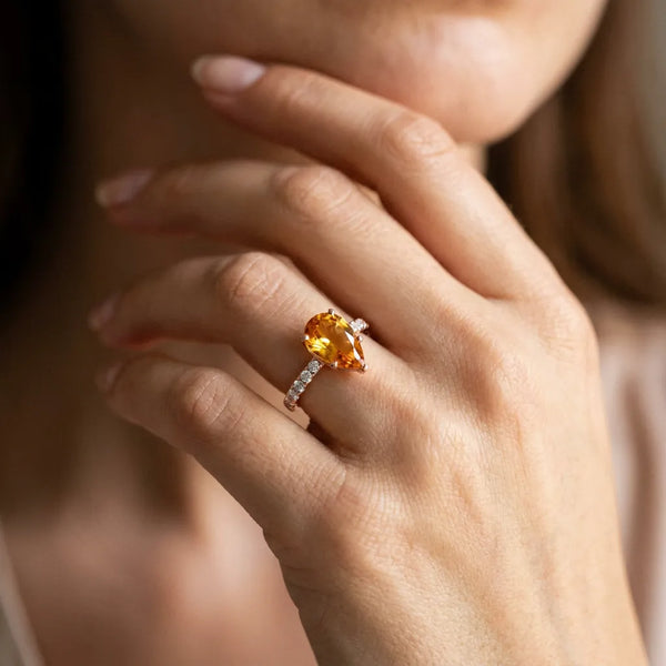 Rose gold Pear Cut Citrine Solitaire Ring with Round  Pavé Band and Four-Prong Setting
