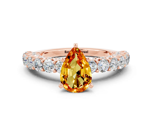Rose gold Pear Cut Citrine Solitaire Ring with Shared Prong Pavé Band and Four-Prong Setting