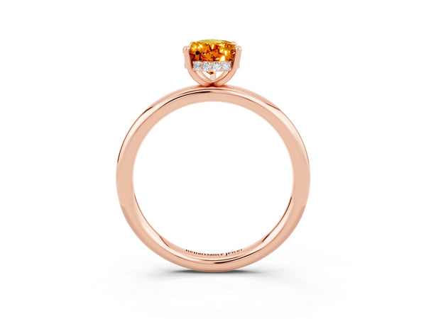 Rose gold Pear Cut Citrine Solitaire Ring with Thin Band and Four-Prong Setting