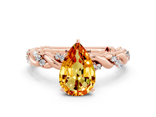 Rose gold Pear Cut Citrine Solitaire Ring with Twisted Band and Pavé Accents