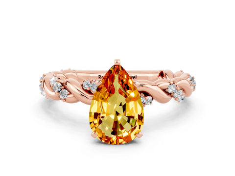Rose gold Pear Cut Citrine Solitaire Ring with Twisted Band and Pavé Accents