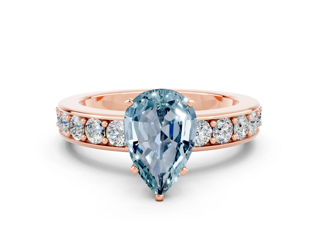 Rose gold Pear Cut Cut Channel Set Diamond Engagement Ring with Four-Prong Setting