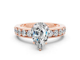 Rose gold Pear Cut Cut Channel Set Diamond Engagement Ring with Four-Prong Setting