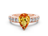 Rose gold Pear Cut Cut Channel Set Diamond Engagement Ring with Four-Prong Setting