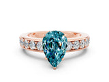 Rose gold Pear Cut Cut Channel Set Diamond Engagement Ring with Four-Prong Setting