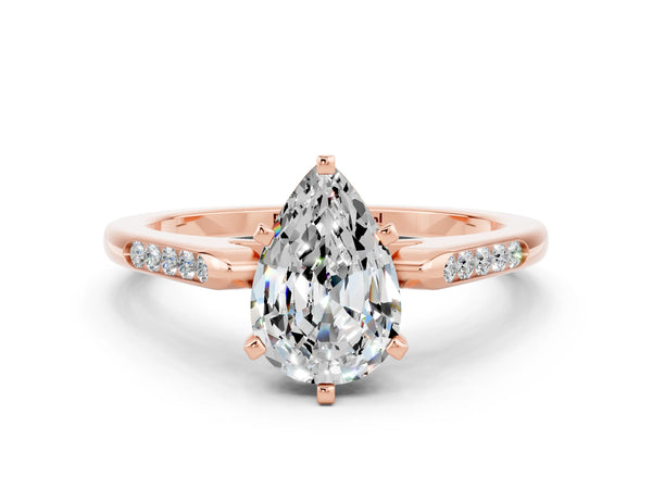Rose gold Pear Cut Moissanite Solitaire Ring with Channel Set Round Band and Prong Setting