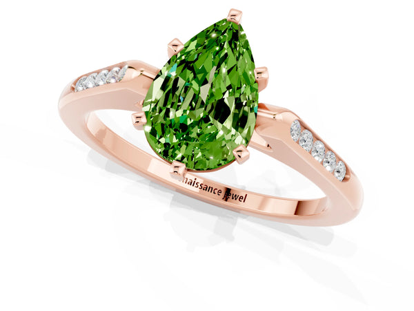 Rose gold Pear Cut Peridot Solitaire Ring with Channel Set Round Band and Prong Setting