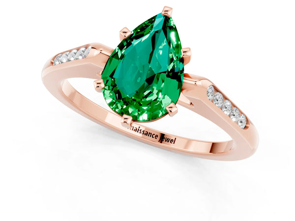 Rose gold Pear Cut Emerald Solitaire Ring with Channel Set Round Band and Prong Setting