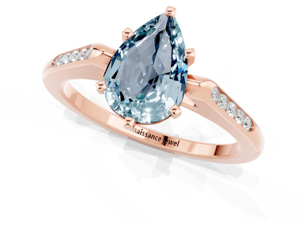 Rose gold Pear Cut Aquamarine Solitaire Ring with Channel Set Round Band and Prong Setting