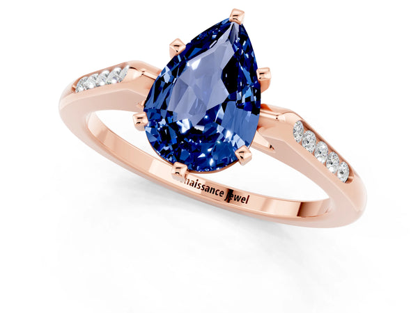 Rose gold Pear Cut Blue Sapphire Solitaire Ring with Channel Set Round Band and Prong Setting