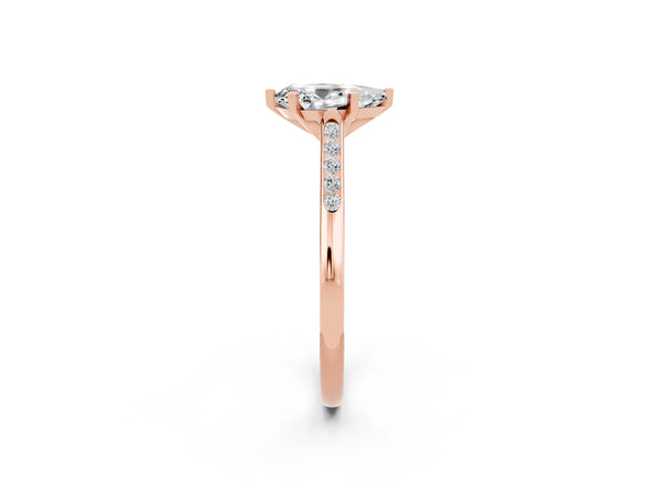 Rose gold Pear Cut Moissanite Solitaire Ring with Channel Set Round Band and Prong Setting