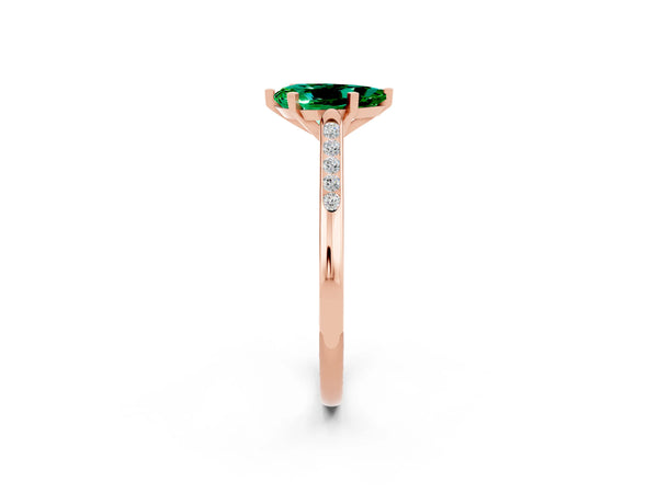 Rose gold Pear Cut Emerald Solitaire Ring with Channel Set Round Band and Prong Setting
