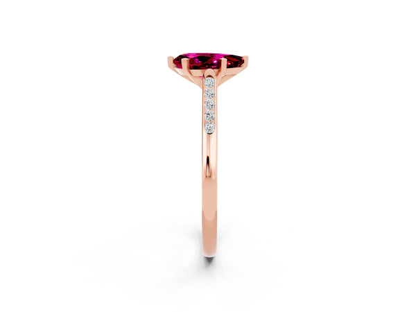 Rose gold Pear Cut Garnet Solitaire Ring with Channel Set Round Band and Prong Setting