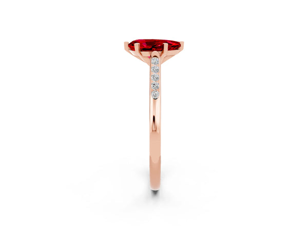 Rose gold Pear Cut Ruby Solitaire Ring with Channel Set Round Band and Prong Setting