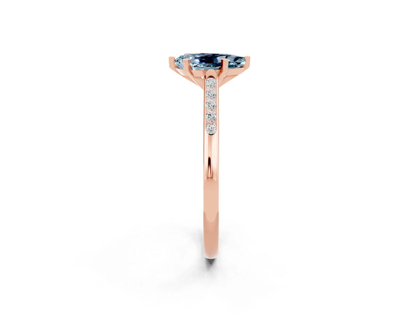 Rose gold Pear Cut Aquamarine Solitaire Ring with Channel Set Round Band and Prong Setting