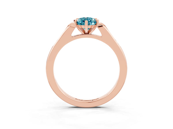 Rose gold Pear Cut Blue Topaz Solitaire Ring with Channel Set Round Band and Prong Setting