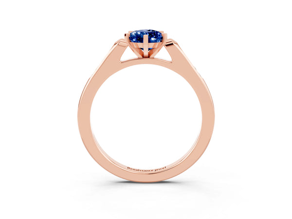 Rose gold Pear Cut Blue Sapphire Solitaire Ring with Channel Set Round Band and Prong Setting