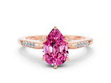 Rose gold Pear Cut Cut Channel Set Solitaire Engagement Ring with Four-Prong Setting