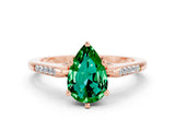 Rose gold Pear Cut Cut Channel Set Solitaire Engagement Ring with Four-Prong Setting