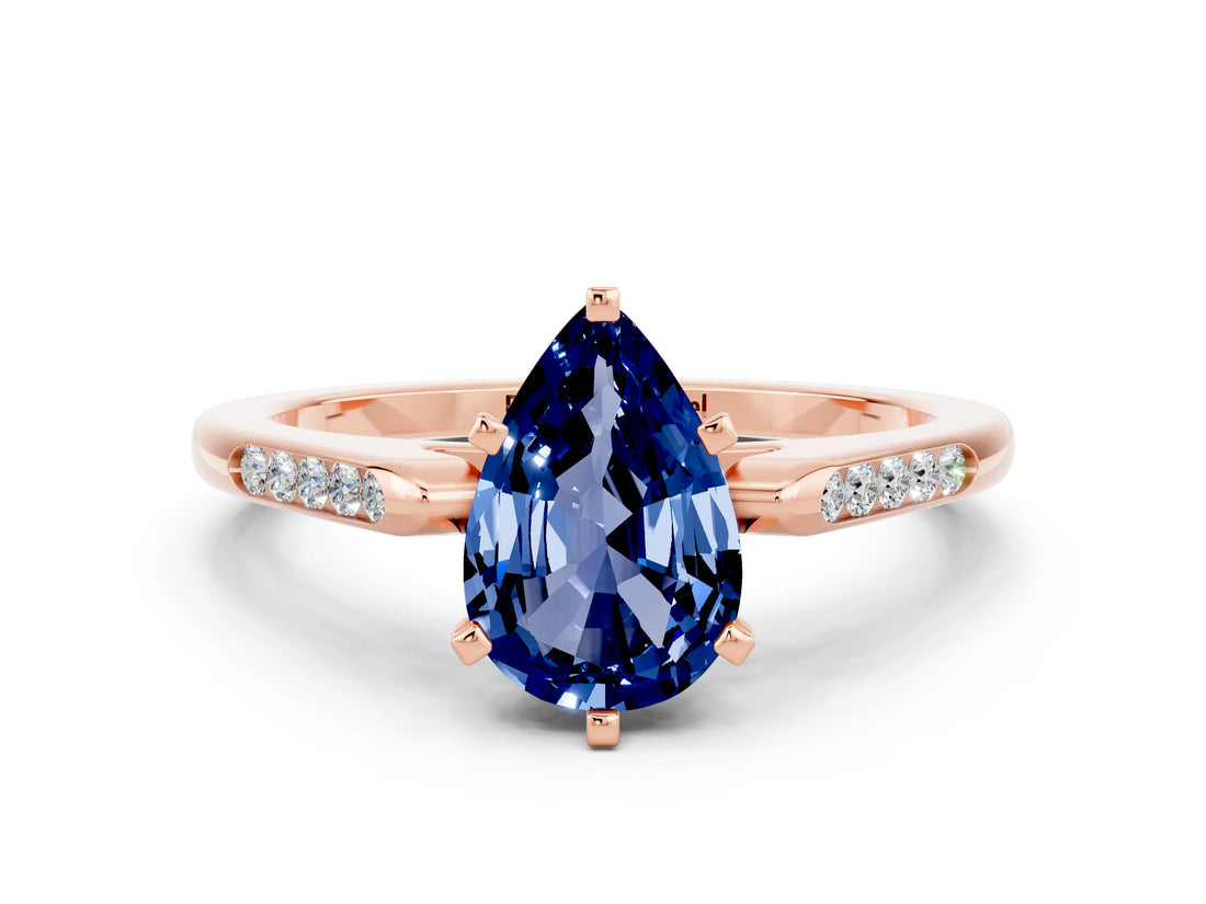 Rose gold Pear Cut Cut Channel Set Solitaire Engagement Ring with Four-Prong Setting
