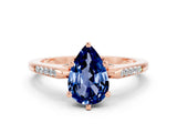 Rose gold Pear Cut Cut Channel Set Solitaire Engagement Ring with Four-Prong Setting