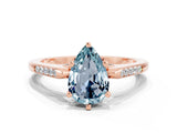 Rose gold Pear Cut Cut Channel Set Solitaire Engagement Ring with Four-Prong Setting