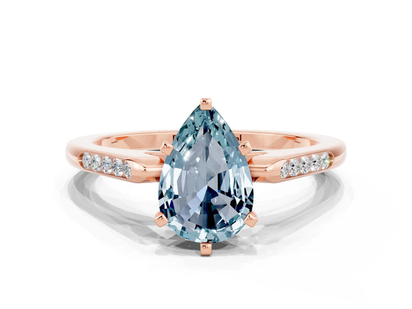 Rose gold Pear Cut Aquamarine Solitaire Ring with Channel Set Round Band and Prong Setting