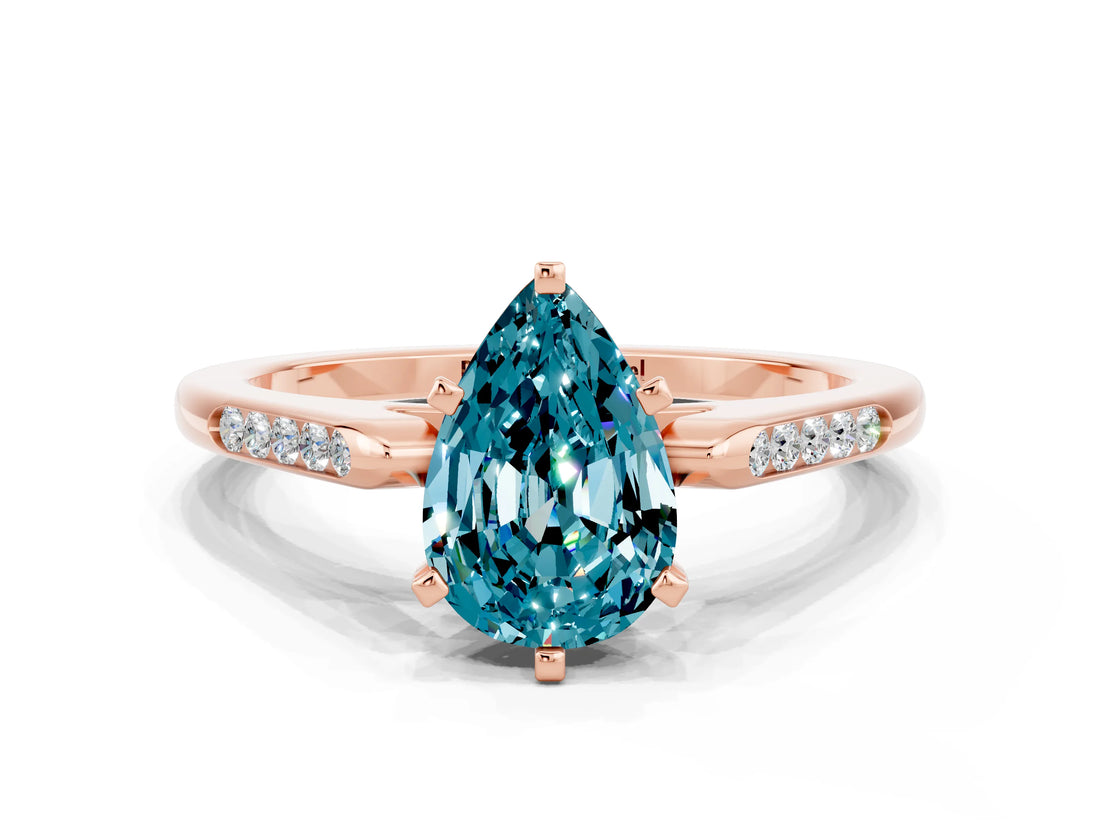 Rose gold Pear Cut Cut Channel Set Solitaire Engagement Ring with Four-Prong Setting