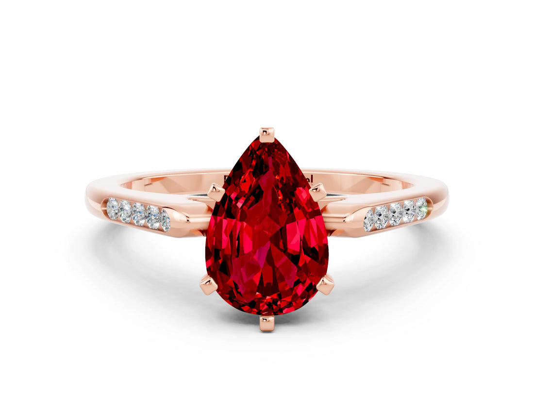 Rose gold Pear Cut Cut Channel Set Solitaire Engagement Ring with Four-Prong Setting