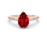Rose gold Pear Cut Cut Channel Set Solitaire Engagement Ring with Four-Prong Setting
