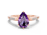 Rose gold Pear Cut Cut Channel Set Solitaire Engagement Ring with Four-Prong Setting