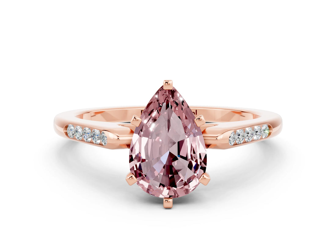 Rose gold Pear Cut Cut Channel Set Solitaire Engagement Ring with Four-Prong Setting