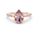 Rose gold Pear Cut Cut Channel Set Solitaire Engagement Ring with Four-Prong Setting