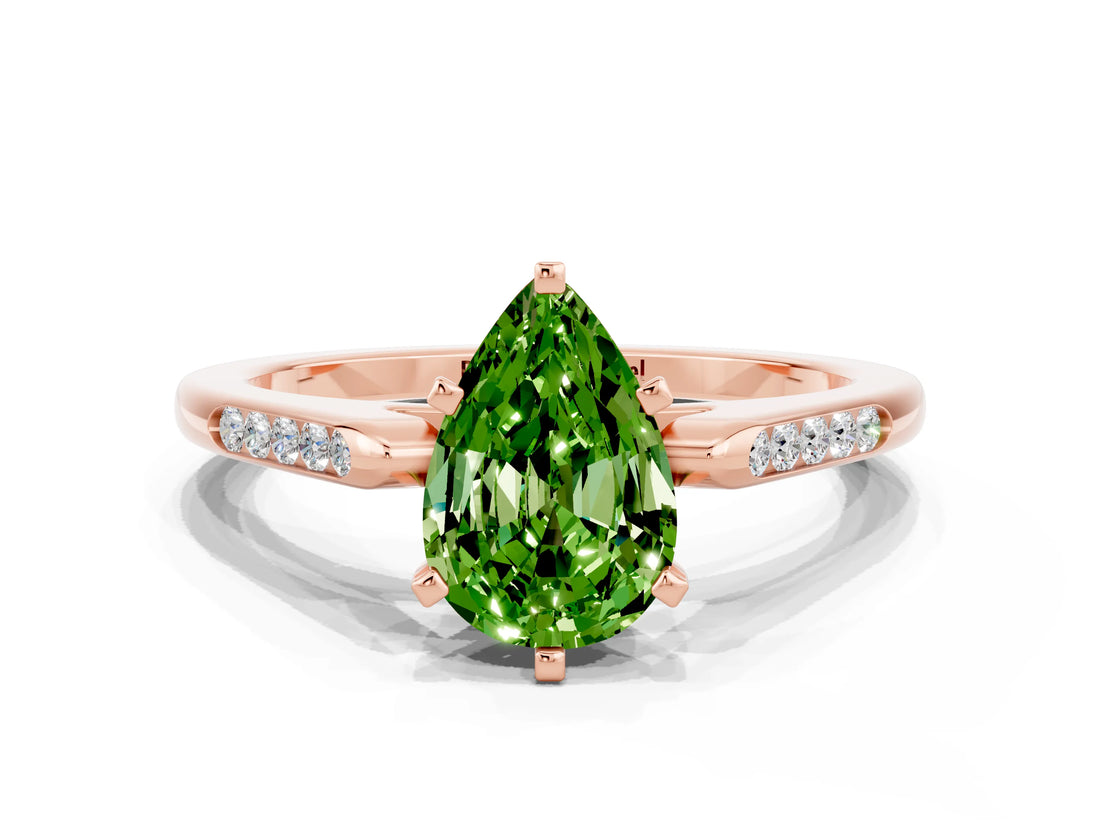 Rose gold Pear Cut Cut Channel Set Solitaire Engagement Ring with Four-Prong Setting
