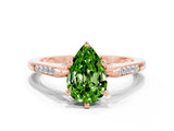 Rose gold Pear Cut Cut Channel Set Solitaire Engagement Ring with Four-Prong Setting