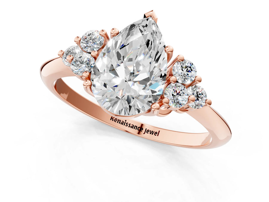 Rose gold Pear Cut Cut Diamond Cluster Ring with Solitaire Band and Four-Prong Setting