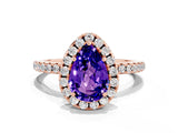 Rose gold Pear Cut Cut Diamond Floral Halo Engagement Ring with Pavé Band and Prong Setting