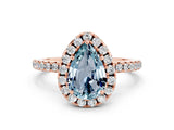 Rose gold Pear Cut Cut Diamond Floral Halo Engagement Ring with Pavé Band and Prong Setting