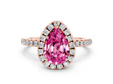 Rose gold Pear Cut Cut Diamond Floral Halo Engagement Ring with Pavé Band and Prong Setting