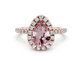 Rose gold Pear Cut Cut Diamond Floral Halo Engagement Ring with Pavé Band and Prong Setting