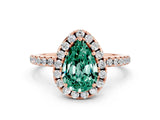 Rose gold Pear Cut Cut Diamond Floral Halo Engagement Ring with Pavé Band and Prong Setting