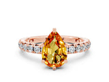 Rose gold Pear Cut Cut Diamond Pavé Band with Four-Prong Setting